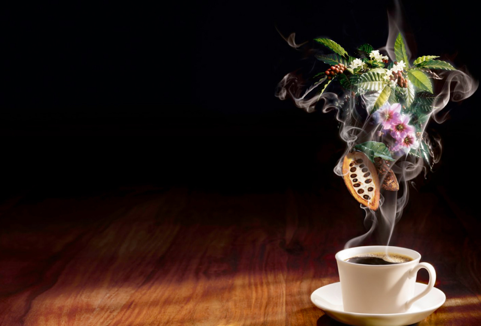 A steaming cup of Lidl coffee with aromatic flowers, coffee cherries and cacao — foodstyling by Nils Grapentin